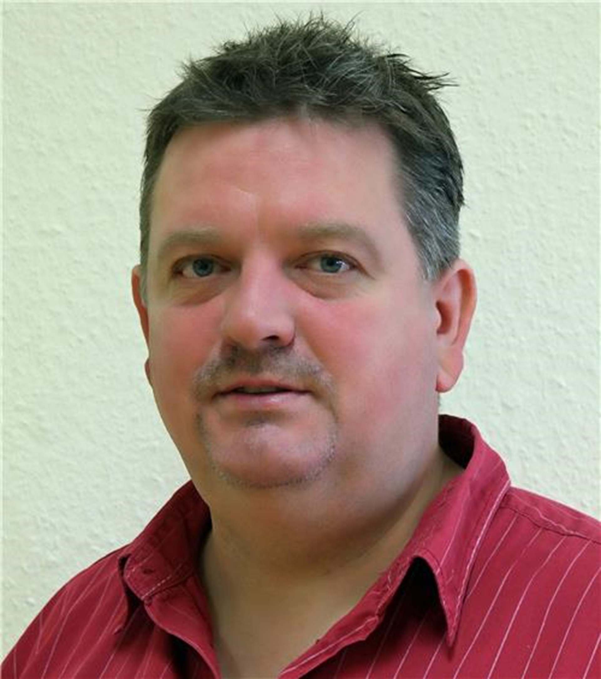Portrait von Mitarbeiter Bluhm