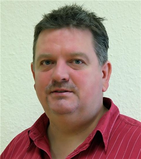 Portrait von Mitarbeiter Bluhm