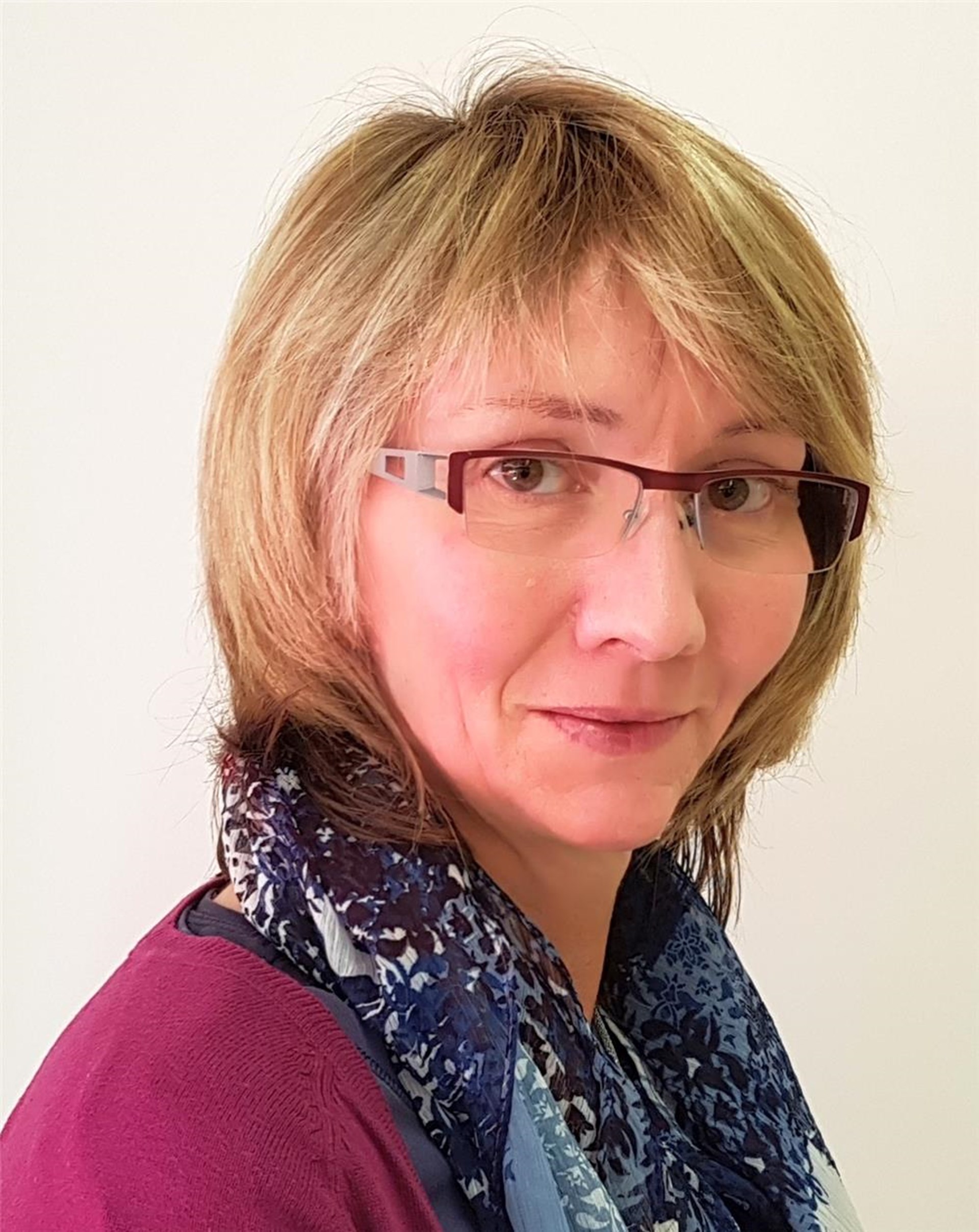 Portraitfoto einer Mitarbeiterin
